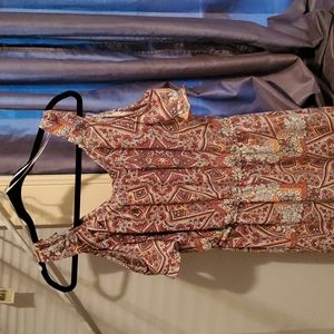 Mid length medium size dress, printed. 100% Polyester